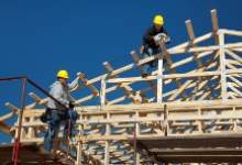 Contractors building a house
