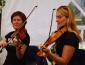 Two musicians playing violins