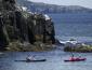 Two kayakers in ocean around St. John's.